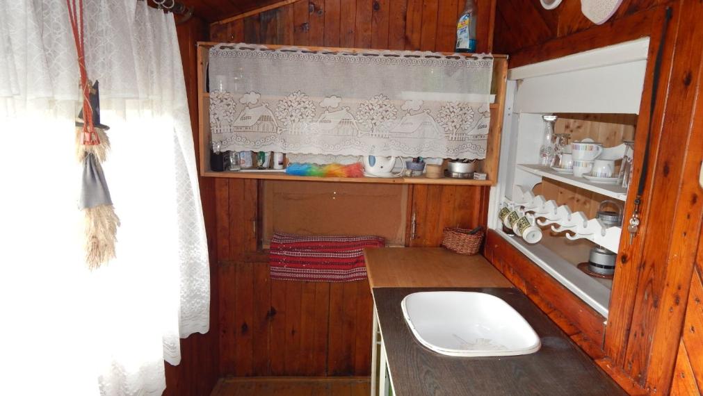 SPEKTRUM REALITY- Na Predaj dve záhradné chatky s pozemkom 1618 m2, záhradkárska osada ,, Mlynárka " Handlová, okres Prievidza