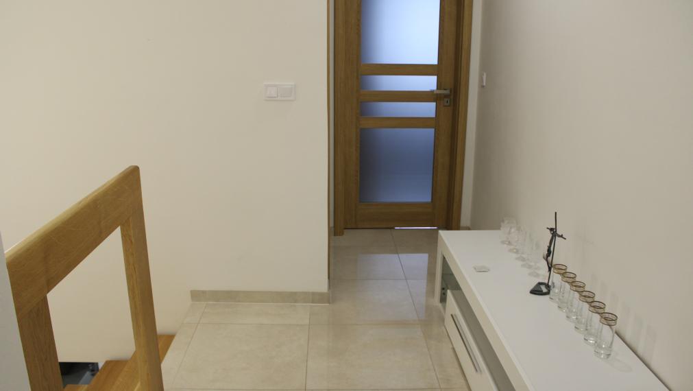 SPEKTRUM REALITY - Na PREDAJ Novostavbu- 4-izbový rodinný dom s garážou, okres Prievidza, ul. R. Jašíka