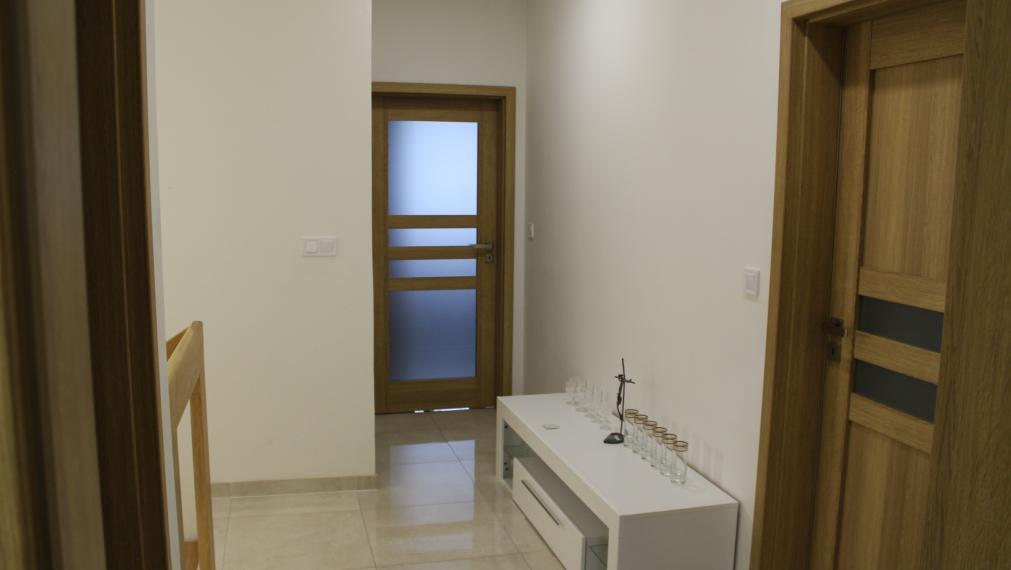 SPEKTRUM REALITY - Na PREDAJ Novostavbu- 4-izbový rodinný dom s garážou, okres Prievidza, ul. R. Jašíka