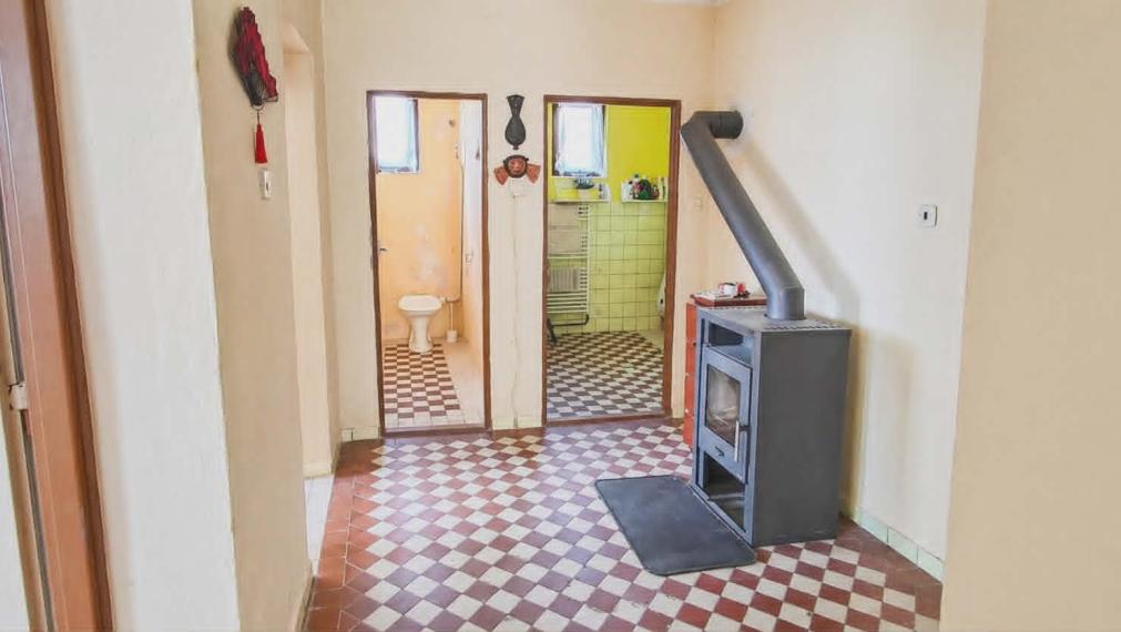 SPEKTRUM REALITY - Na PREDAJ Rodinný dom s garážou, pozemkom 802 m2, Nitrianske Pravno, okres Prievidza